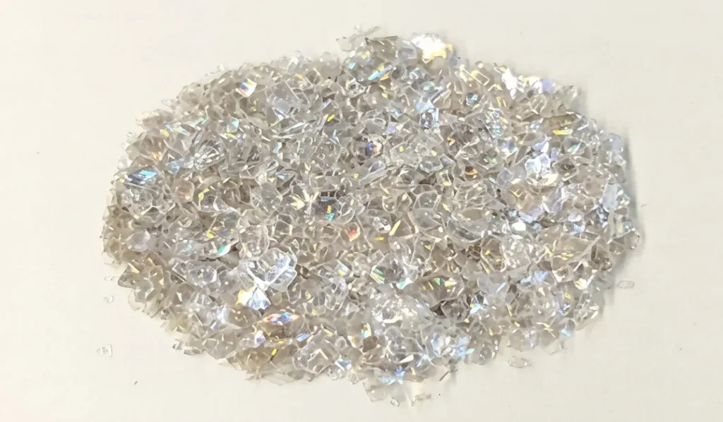 An oval-shaped cluster of translucent mica flakes